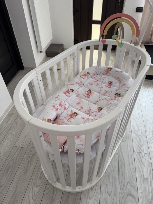Vând pătuț bebe Marvis – oval/rotund, transformabil 9 în 1 – ALB