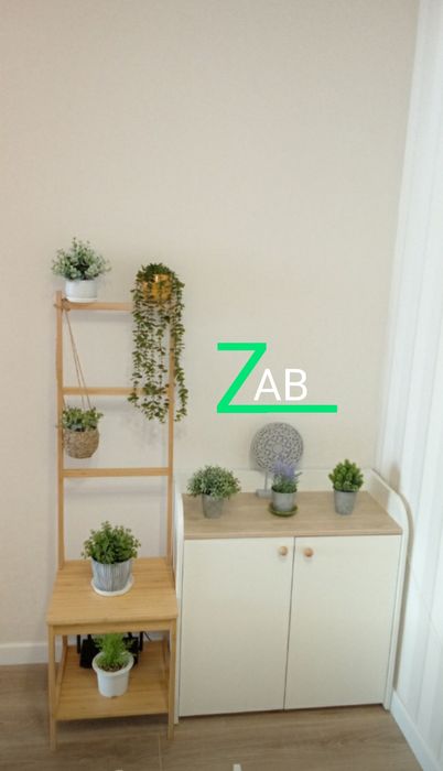 Комод для одежды и игрушек с двумя распашными дверками.