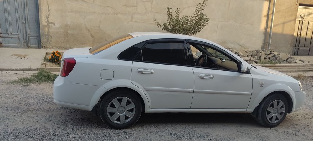 Срочна сотилади Ласетти 2006 йил карески матор