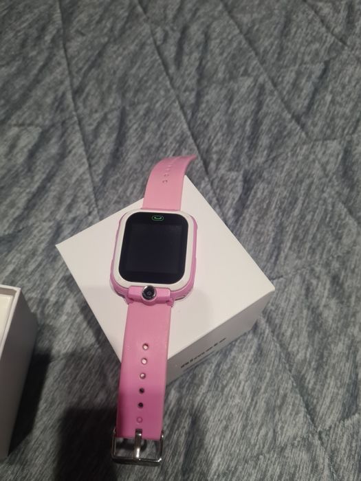 Продам  детские часы телефон