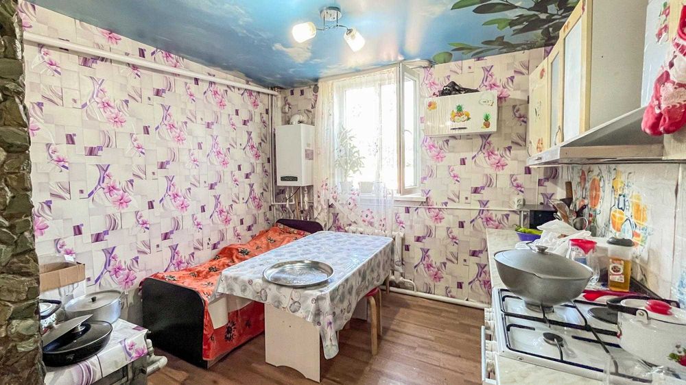 Дом в Отенай, Танат Империя