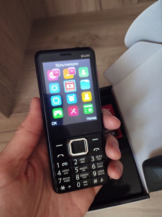 Телефон кнопочный