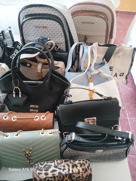 Дамски чанти висок клас раници кожени чанти с далга дражка.