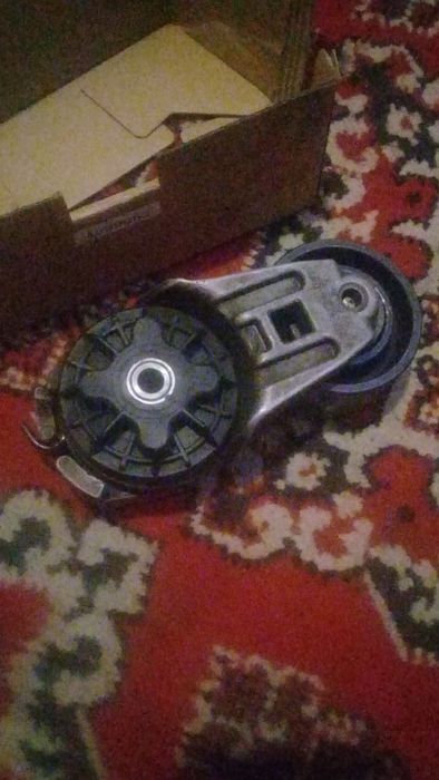 Натяжитель с роликом QSM 11 серии 2000