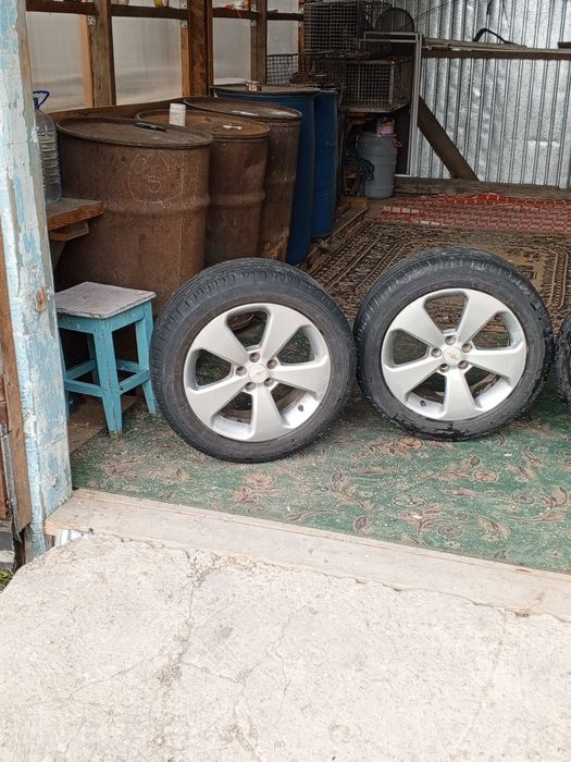 Продам титановые диски с резиной