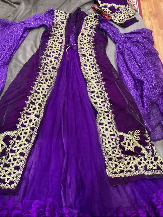 Нарядное платье и национальный атласовый чупан со штанами.