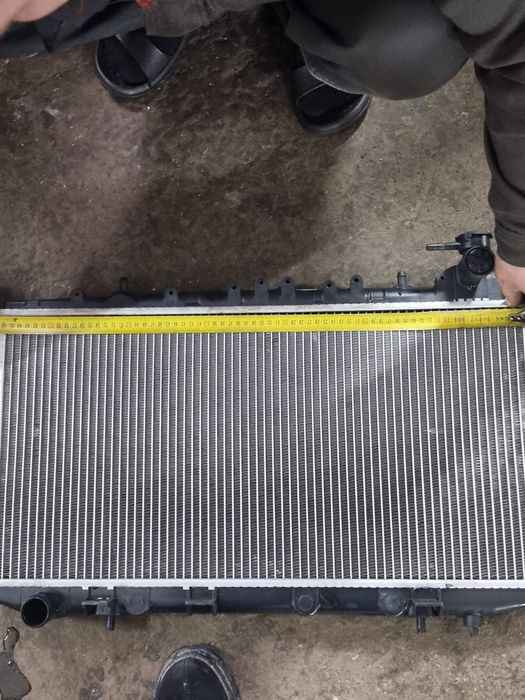 Радиатор Nissan Preria