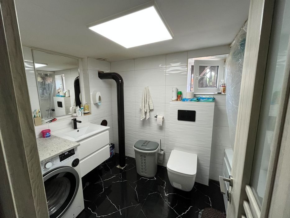Casă renovată complet + teren 2100 mp