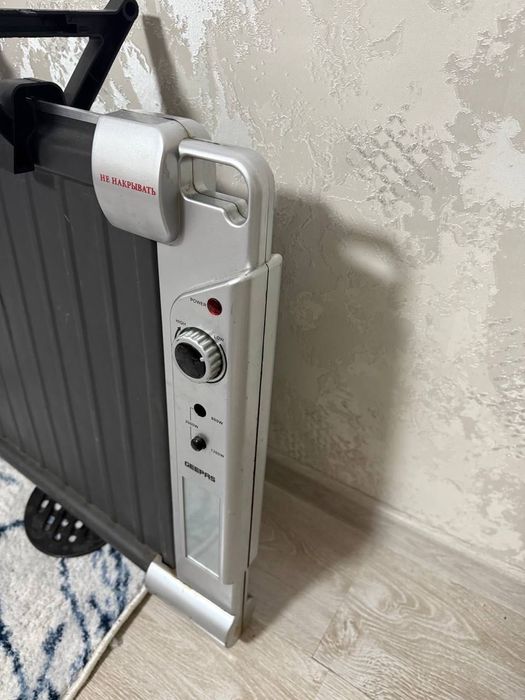 Масляный панельный обогреватель