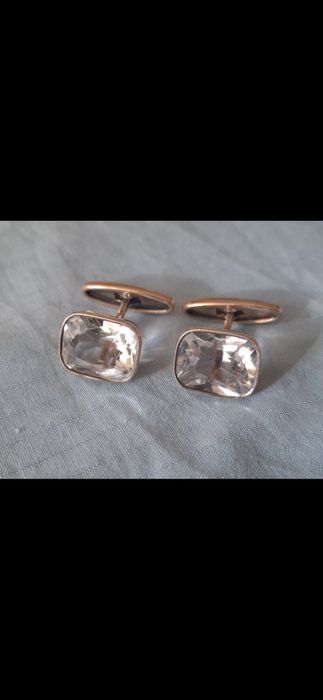 Серебряные запонки.