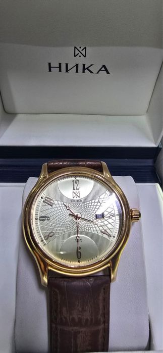 Золотые часы Ника