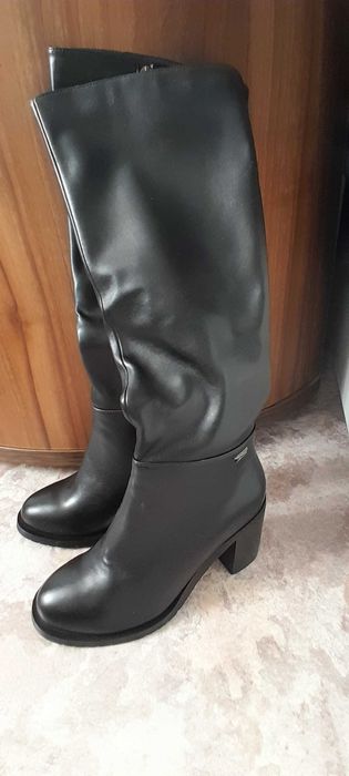 Продам новые сапоги