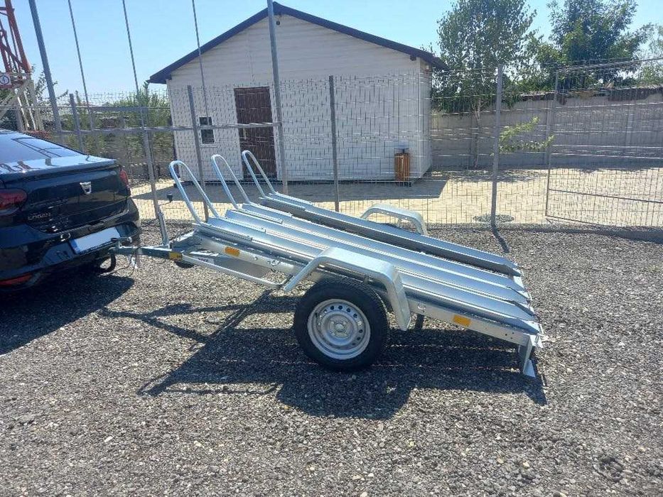 INCHIRIEZ Remorca Moto Basculabila 3 Posturi -  2024