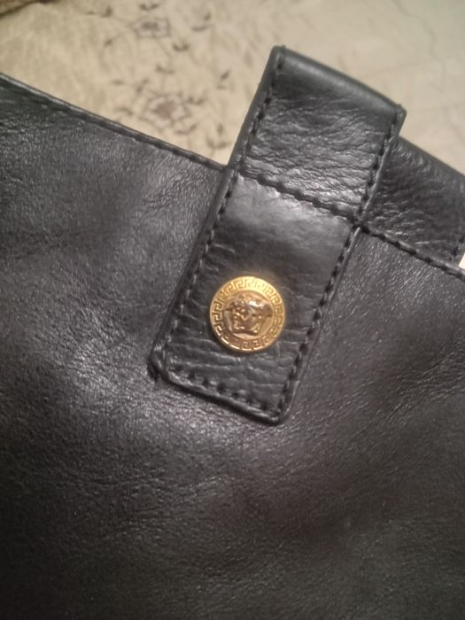 Кожанные сапоги Versace.