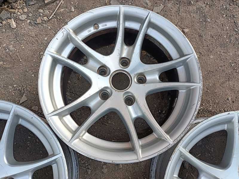 Продам оригинальные легкосплавные диски на BMW 5 e34