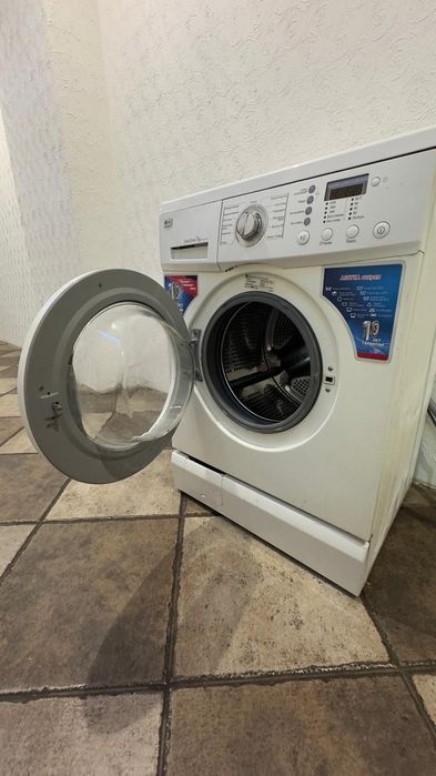 Cтиральную машину модель  LG.