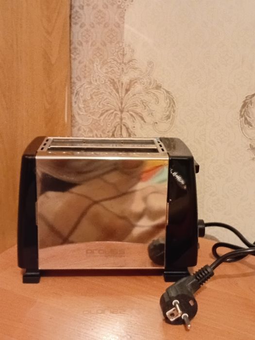 Продам тостер новый