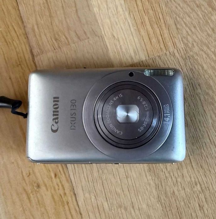 Canon IXUS 130 ултра компактен цифров фотоапарат, дигитална камера в сребърен цвят, отлично състояние, пълен комплект, работи перфектно!