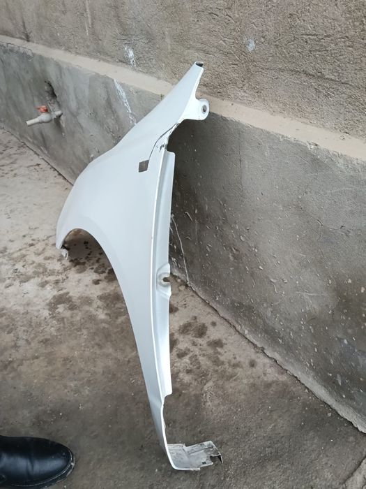 Левое Крыло шевролет кобальт 15000