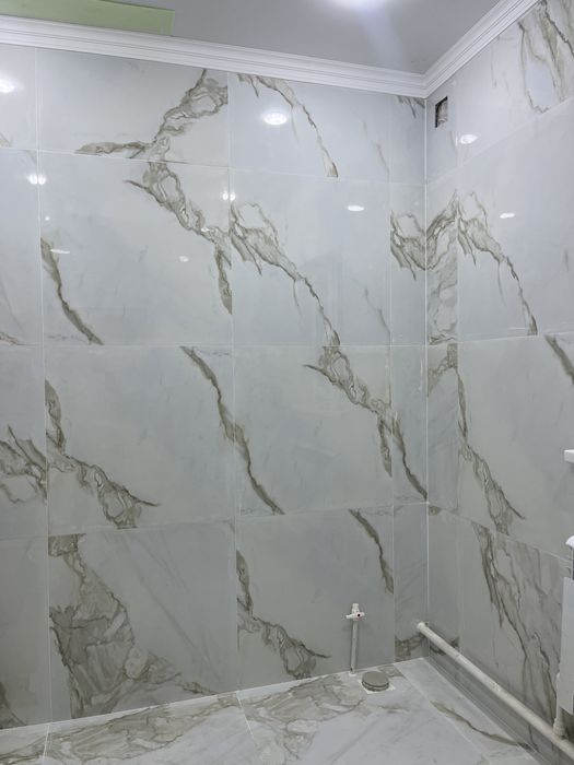 Опытный кафельщик