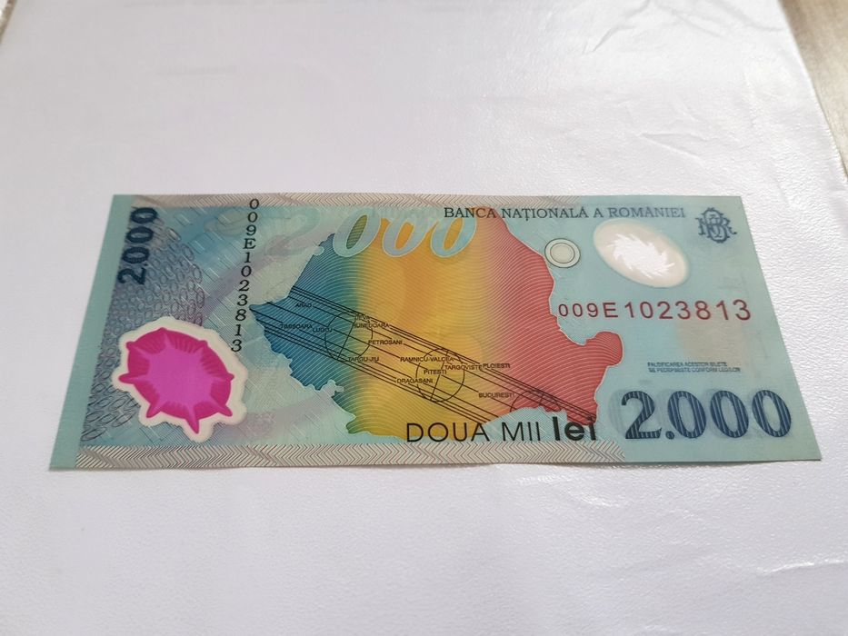 Bancnota 2000 lei eclipsa de soare și moneda 500 lei