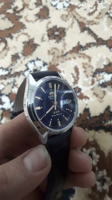 Ориент Три Стар.