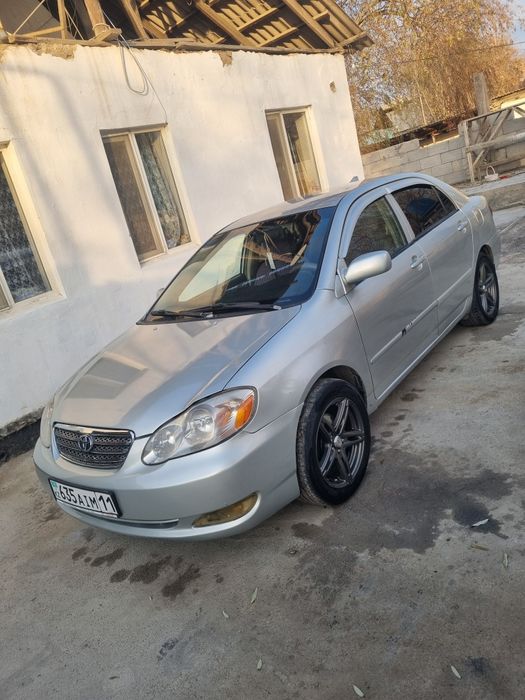 Машина тойота королла