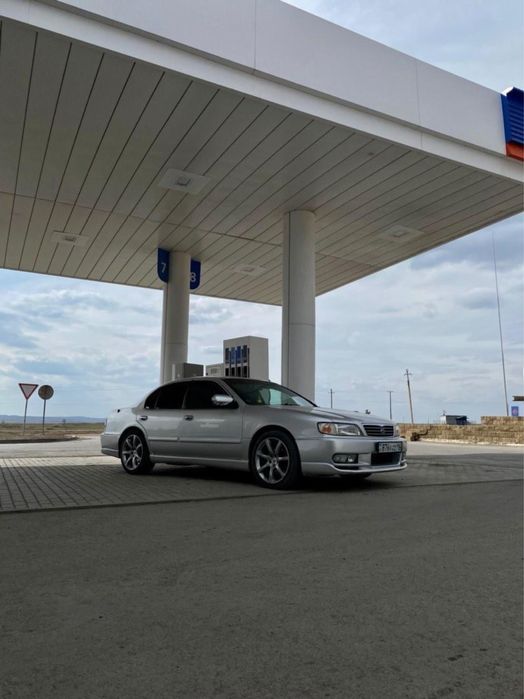 Задний бампер Спойлер Nissan Cefiro a32
