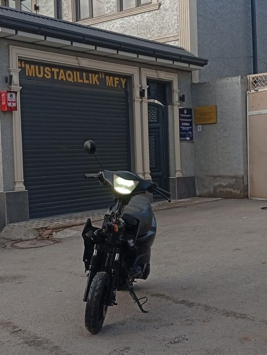 скутер бензиновый