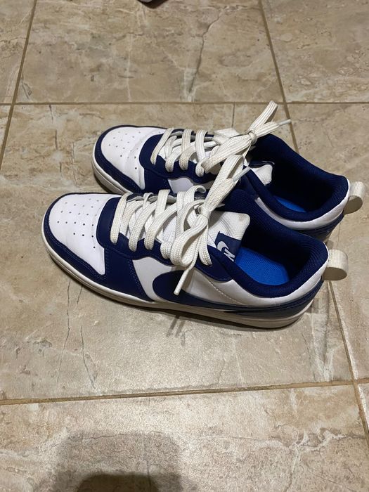 Сини Nike обувки
