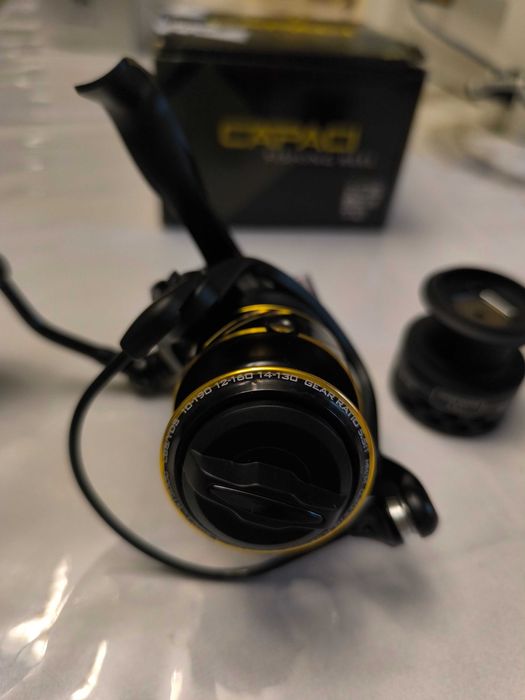 Продам новый спиннинговую катушку 3000