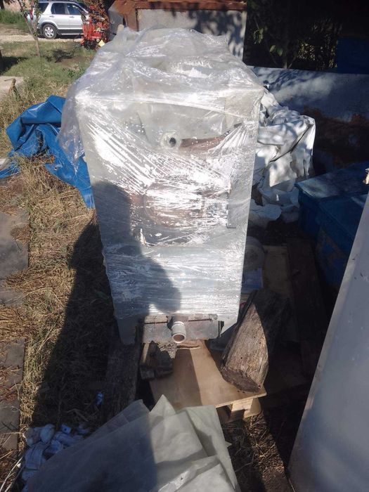 Комбиниран котел на пелети и дърва