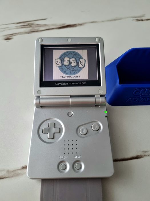GameBoy Advance SP + The lion king + stand