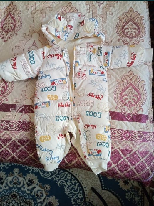 Продам детские комбинезоны