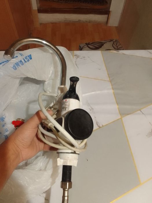 Продам проточный водоногреватель .