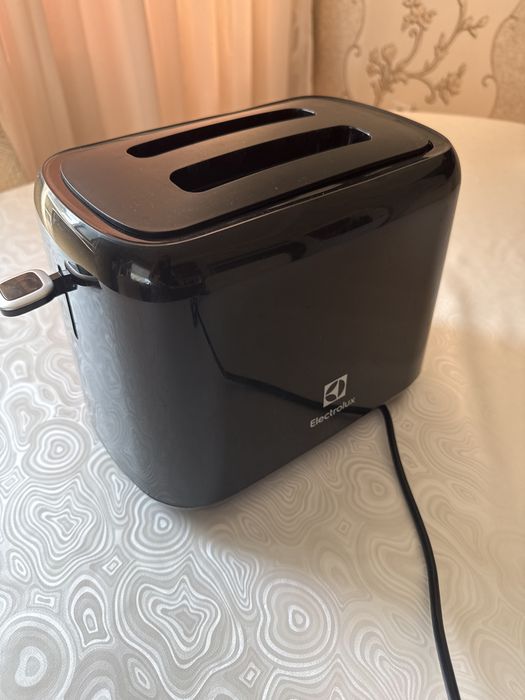 Продам тостер Electrolux