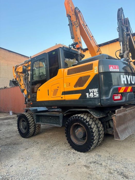 Услуги колесного экскаватора