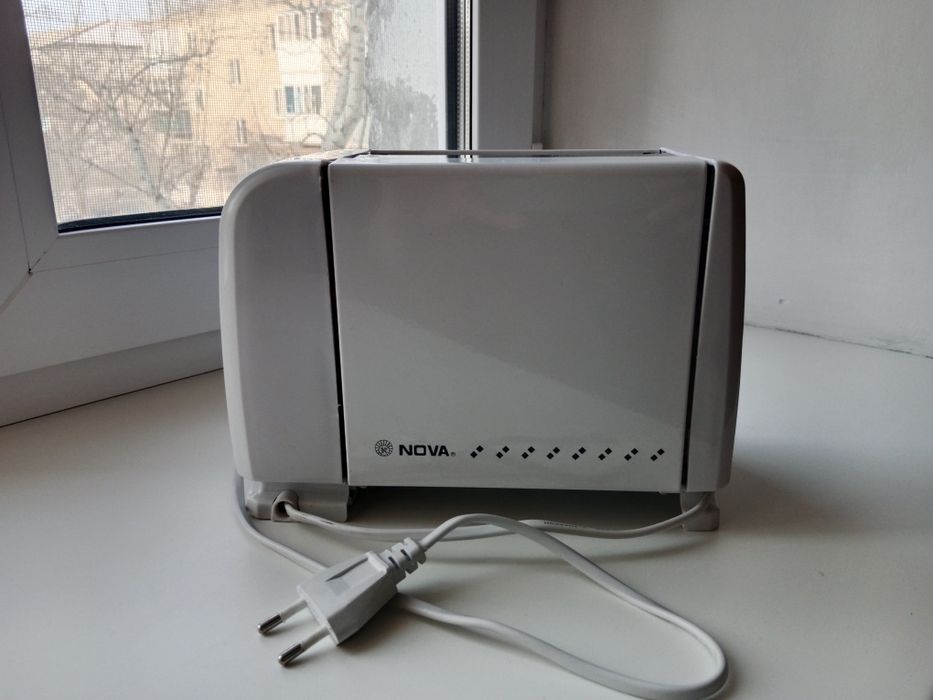 Продам тостерницу NOVA RX 2219C новая