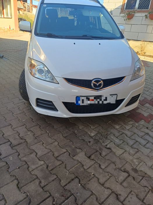 Vând mazda 5, 7 locuri!