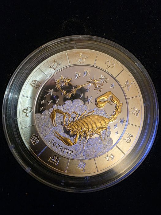 Серебряная монета Руанды, с позолотой и брилиантами