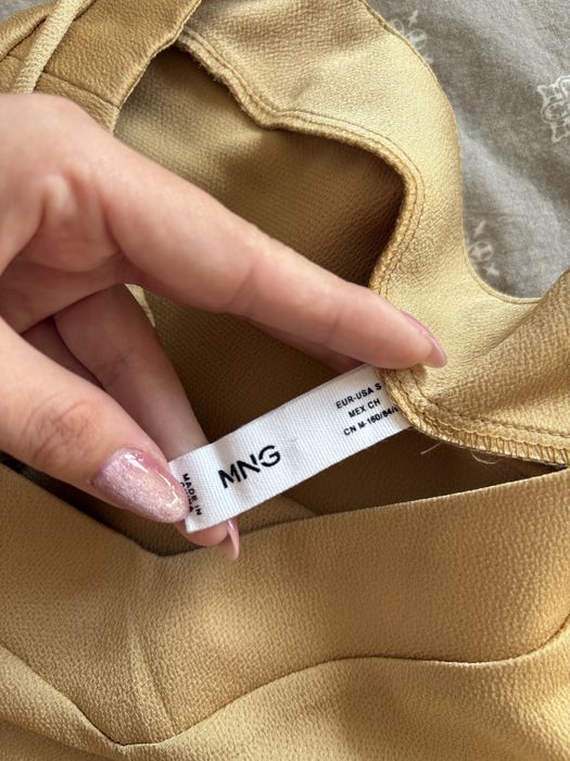 Официален потник на Манго