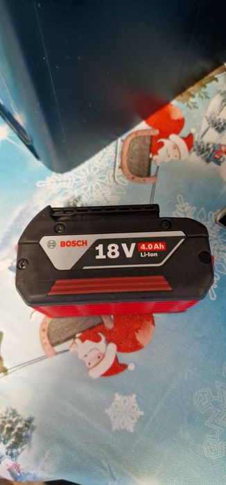 Titlu:Bosch GKS 18V-LI + baterie 4.0Ah + încărcător 18V-20