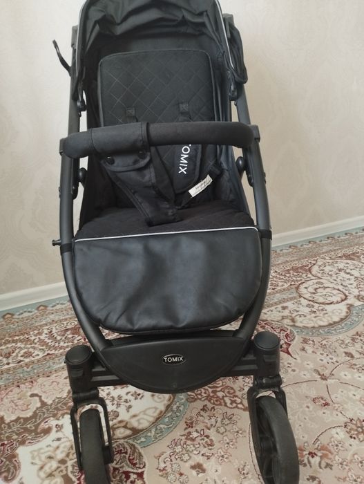 Продам коляску Tomix оригинал в отличном состоянии