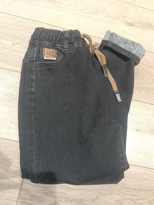 Джинсы почти новые