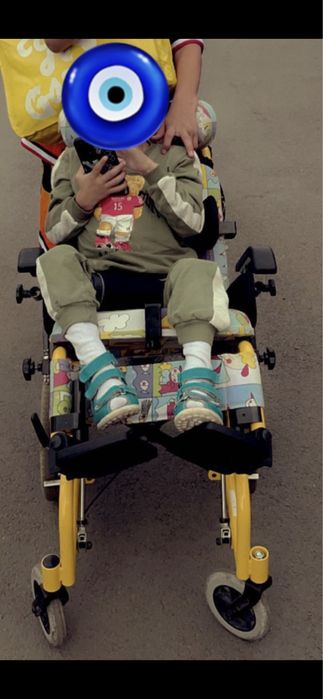 Детская инвалидная коляска