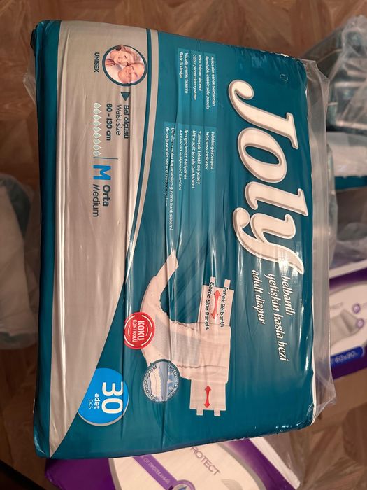 Продам памперсы с пеленками