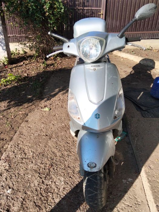 Scuter  125 cp m