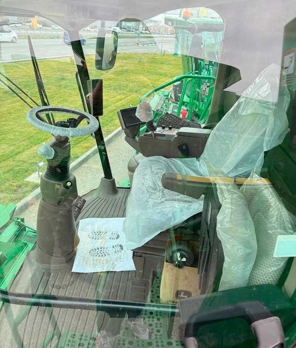 John Deere S 670 комбайн