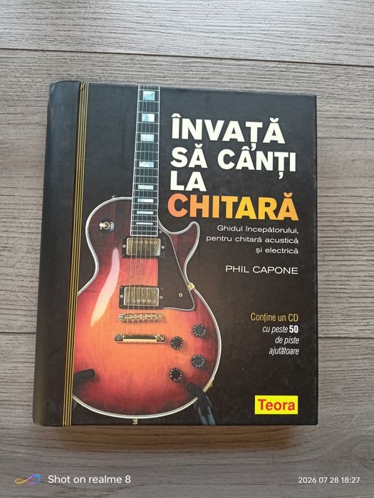 Carte Invata sa canti la chitara