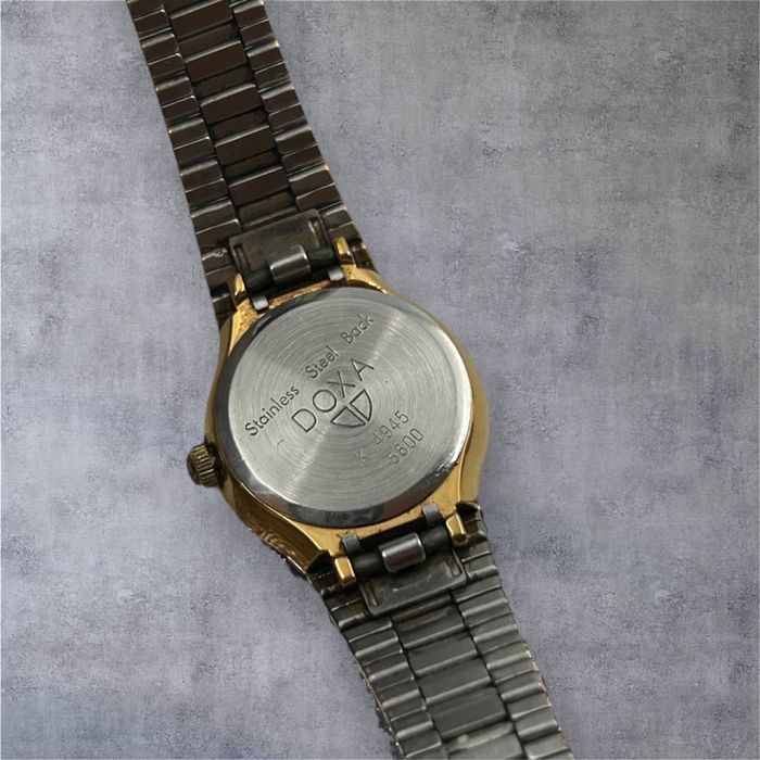 Doxa дамски швейцарски часовник с позлата
